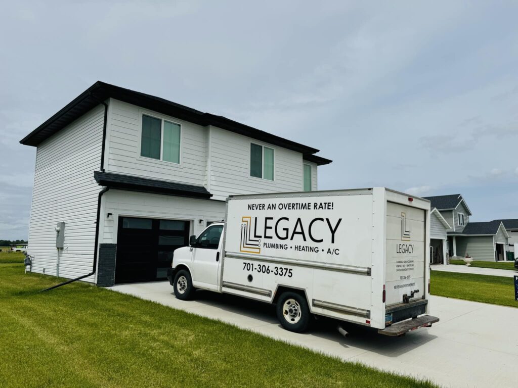 LEGACY TRUCK IN DRIVEWAY