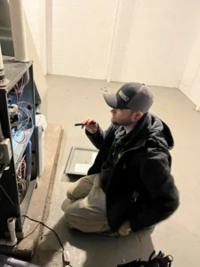 A LEGACY technician performing heater repair on a Moorhead, MN, heater